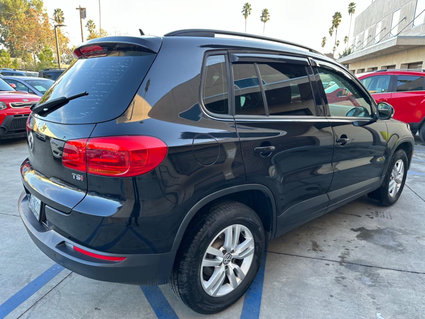 2016 Black /Black Volkswagen Tiguan (WVGAV7AX5GW) , AUTOMATIC transmission, located at 30 S. Berkeley Avenue, Pasadena, CA, 91107, (626) 248-7567, 34.145447, -118.109398 - Crown City Motors is a used “Buy Here Pay Here” car dealer in Pasadena CA. “Buy Here Pay Here” financing, means that when you purchase your vehicle from our dealership, that you make the payments to the dealership as well. We do not need the banks approval to get you approved for a used auto - Photo#5